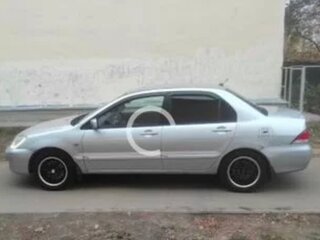 2005 Mitsubishi Lancer IX Рестайлинг, серебристый, 210000 рублей, вид 5