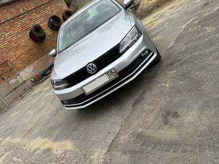 2014 Volkswagen Jetta VI Рестайлинг, серебристый, 1400000 рублей, вид 1