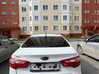 2012 Kia Rio 5-speed III, белый, 590000 рублей, вид 5
