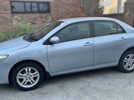 2007 Toyota Corolla X (E140, E150), голубой, 660000 рублей, вид 1