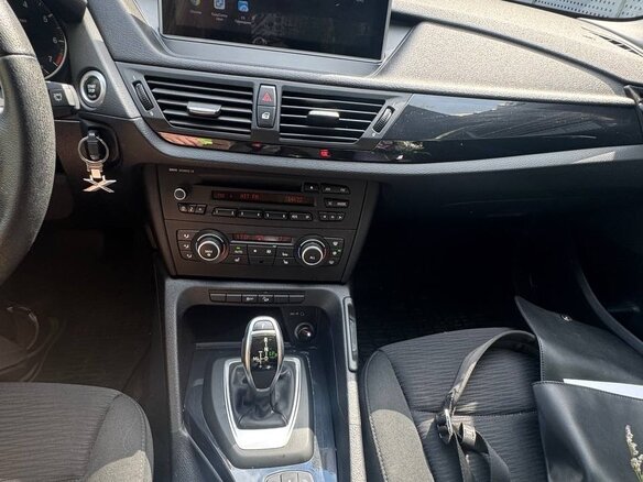 2012 BMW X1 20i I (E84), серый - вид 15