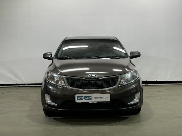 2014 Kia Rio III, коричневый - вид 1