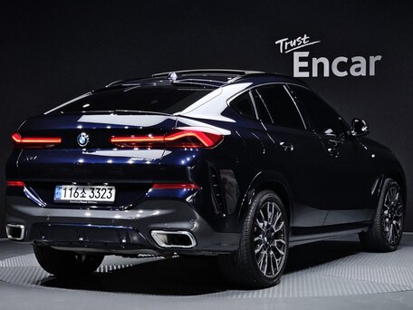 2024 BMW X6 40i III (G06) Рестайлинг, синий, 11417000 рублей, вид 4