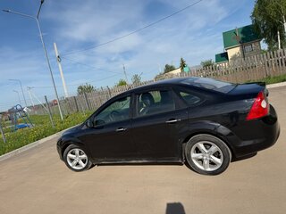 2010 Ford Focus II Рестайлинг, чёрный, 455555 рублей, вид 1