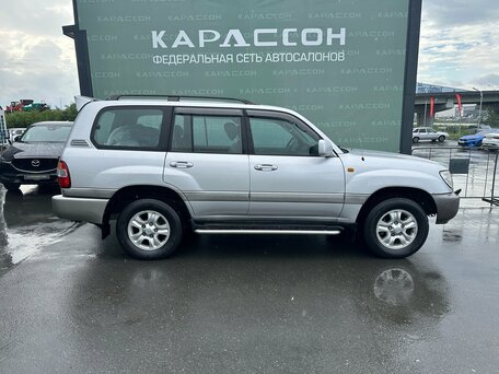 2006 Toyota Land Cruiser 100 Series Рестайлинг 2, серебристый, 2125000 рублей, вид 4