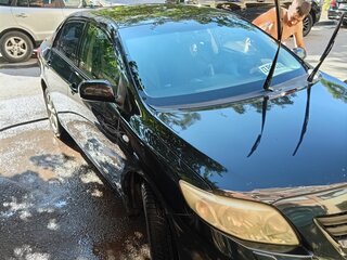 2009 Toyota Corolla X (E140, E150), чёрный, 650000 рублей, вид 3