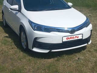 2016 Toyota Corolla XI (E160, E170, E180) Рестайлинг 1, белый, 1445000 рублей, вид 3