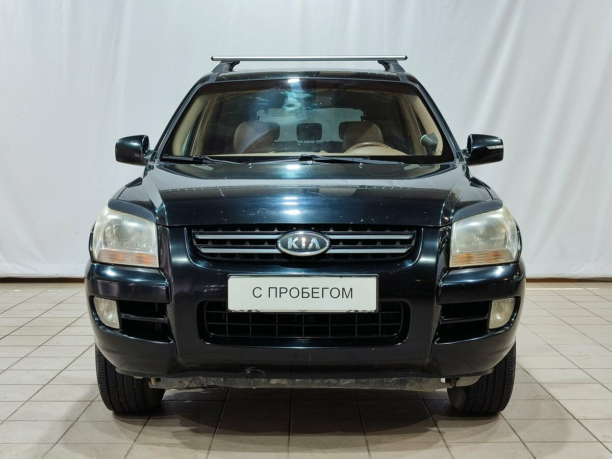 Открыть фотографии: Kia Sportage II