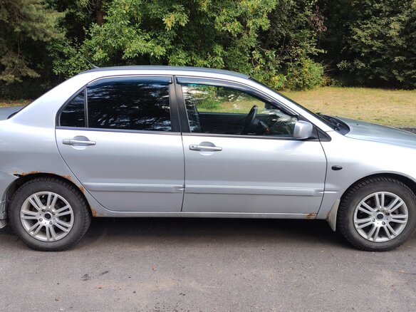 2006 Mitsubishi Lancer IX Рестайлинг, серебристый - вид 1