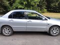 2006 Mitsubishi Lancer IX Рестайлинг, серебристый - вид 1