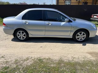 2005 Mitsubishi Lancer IX, серебристый, 410000 рублей, вид 3