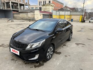 2012 Kia Rio III, чёрный, 606000 рублей, вид 1