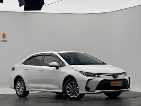 2022 Toyota Corolla XII (E210), белый, 1560000 рублей, вид 2