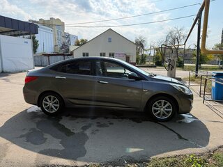 2011 Hyundai Solaris I, чёрный, 690000 рублей, вид 2