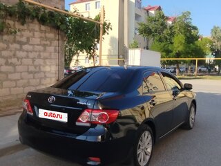 2010 Toyota Corolla X (E140, E150) Рестайлинг, чёрный, 860000 рублей, вид 3