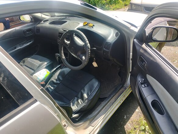 2000 Mazda Familia Y11, серебристый - вид 4