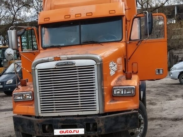 2003 Freightliner FLD, оранжевый, 1350000 рублей