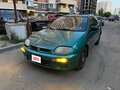 1997 Mazda 323 V (BA), зелёный, 255000 рублей - вид 1