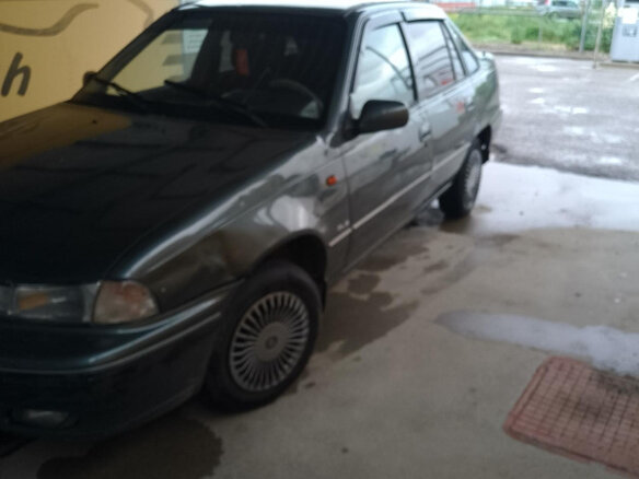 1997 Daewoo Nexia I, серый, 130000 рублей - вид 1