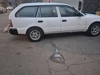 2000 Toyota Corolla VII (E100), белый, 290000 рублей, вид 3