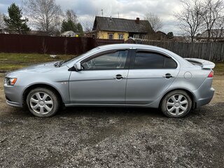 2010 Mitsubishi Lancer X, серебристый, 830000 рублей, вид 3