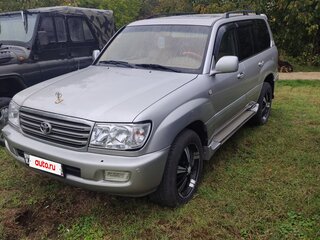 2005 Toyota Land Cruiser 105 100 Series Рестайлинг 1, белый, 1800000 рублей, вид 1