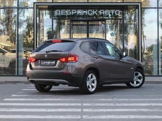 2011 BMW X1 18i I (E84), коричневый, 1020000 рублей, вид 3