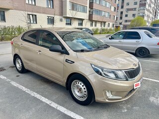 2013 Kia Rio 4-speed III, бежевый, 820000 рублей, вид 2