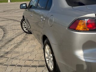 2012 Mitsubishi Lancer X Рестайлинг, серебристый, 850000 рублей, вид 4