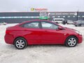 2011 Hyundai Solaris I, красный, 729000 рублей - вид 2