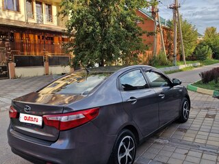 2013 Kia Rio 4-speed III, серый, 850000 рублей, вид 3