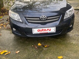 2010 Toyota Corolla X (E140, E150) Рестайлинг, чёрный, 850000 рублей, вид 2