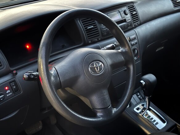 2004 Toyota Corolla IX (E120, E130) Рестайлинг, чёрный - вид 7