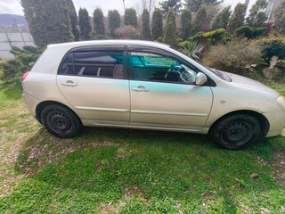 2006 Toyota Corolla IX (E120, E130) Рестайлинг, серебристый, 575000 рублей, вид 2