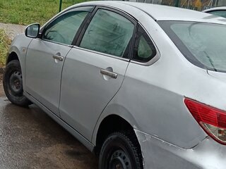 2014 Nissan Almera III (G15), серебристый, 190000 рублей, вид 3