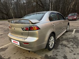 2012 Mitsubishi Lancer X Рестайлинг, серебристый, 849000 рублей, вид 3