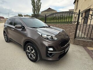 2019 Kia Sportage IV Рестайлинг, коричневый, 1850000 рублей, вид 1