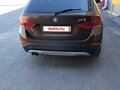 2013 BMW X1 20i I (E84) Рестайлинг, коричневый, 1360000 рублей - вид 10