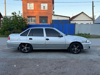 2012 Daewoo Nexia I Рестайлинг, серебристый, 240000 рублей, вид 4