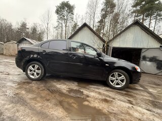 2010 Mitsubishi Lancer X, чёрный, 680000 рублей, вид 3