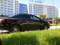 2010 Toyota Corolla X (E140, E150) Рестайлинг, чёрный, 1100000 рублей - вид 7