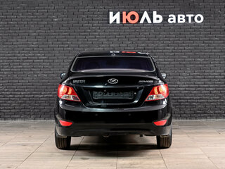 2012 Hyundai Solaris I, чёрный, 530000 рублей, вид 3