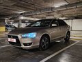 2007 Mitsubishi Lancer X, бежевый, 600000 рублей - вид 1