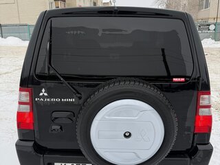 2011 Mitsubishi Pajero Mini II, чёрный, 650000 рублей, вид 3
