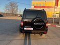 2020 УАЗ Патриот I Рестайлинг 3, коричневый, 1430000 рублей - вид 2