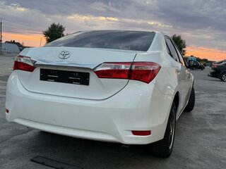 2014 Toyota Corolla XI (E160, E170, E180), белый, 1100000 рублей, вид 2