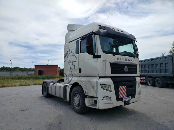 2023 Sinotruk Sitrak C7H, белый - вид 1