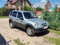 2015 Chevrolet Niva I Рестайлинг, серебристый, 360000 рублей - вид 1