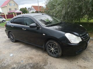 2014 Nissan Almera III (G15), чёрный, 750000 рублей, вид 2