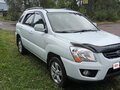 2010 Kia Sportage II Рестайлинг, белый - вид 2